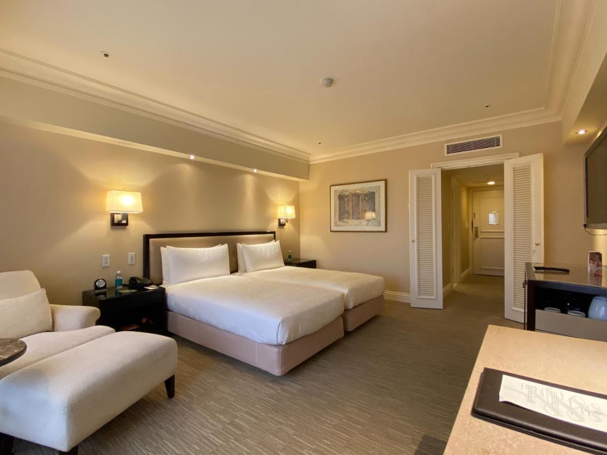 The Sherwood Taipeh Exterior foto A room at the Fullerton Hotel